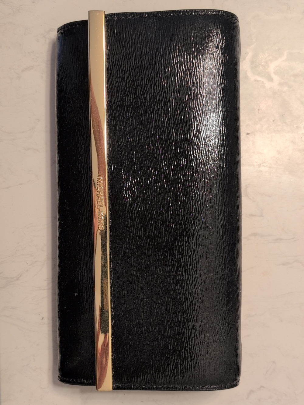 Michael Kors Black Patent Clutch with Gold Accent Bar
